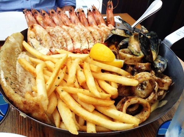 Seafood Platter for 2 - Tiger prawns, dory fillet, calamari coupled with blue mussels in garlic lemon butter sauce, all served in a bed of Paella rice and chips. photo 03_zps93a07e36.jpg